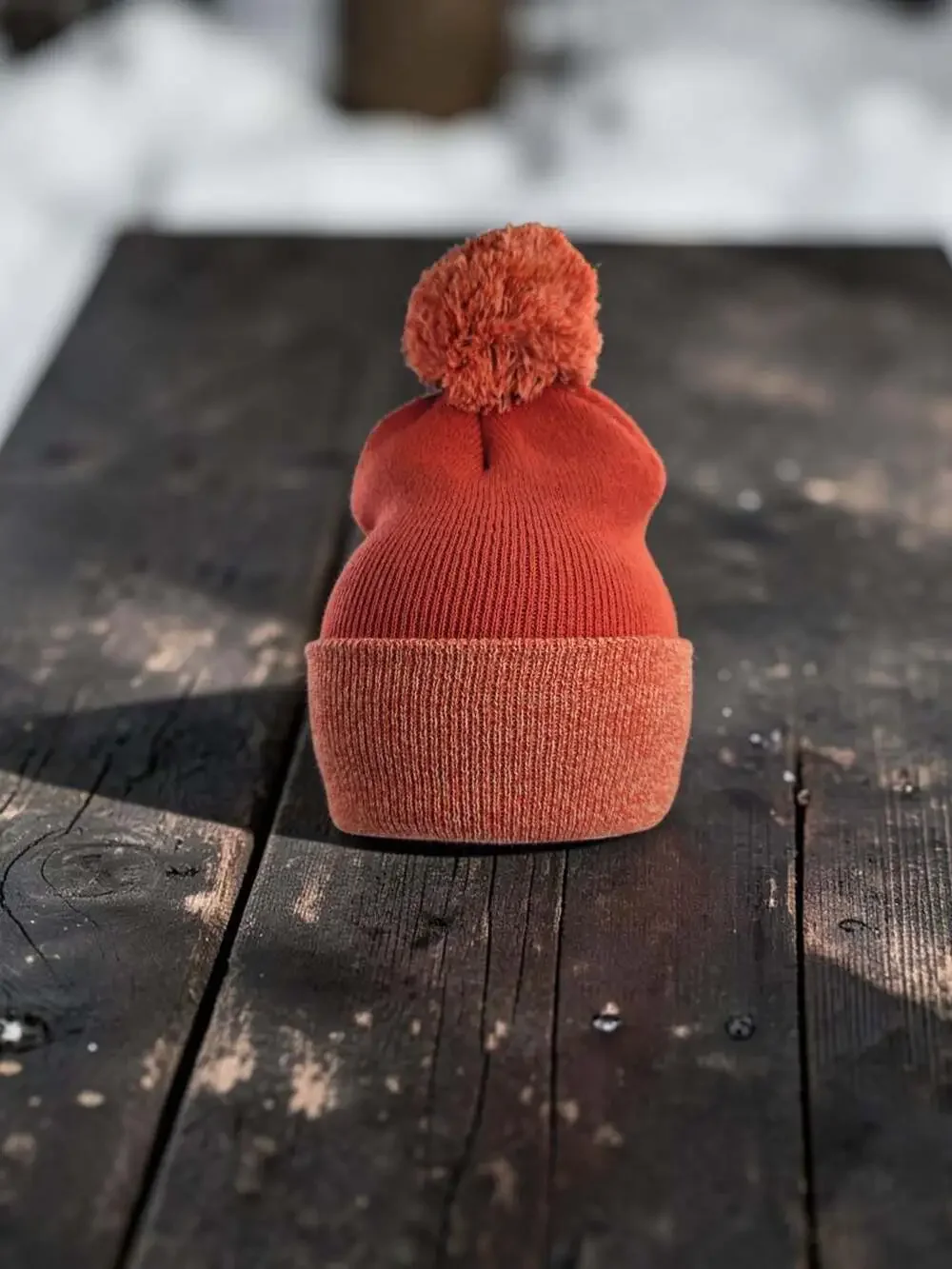 Carhartt Women's Lookout Pom Cuffed Knit Beanie Hat in Rust Orange